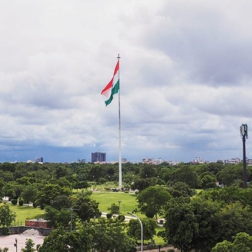 Central Park Jaipur with green lawns, walking tracks, and the national flag in the city center